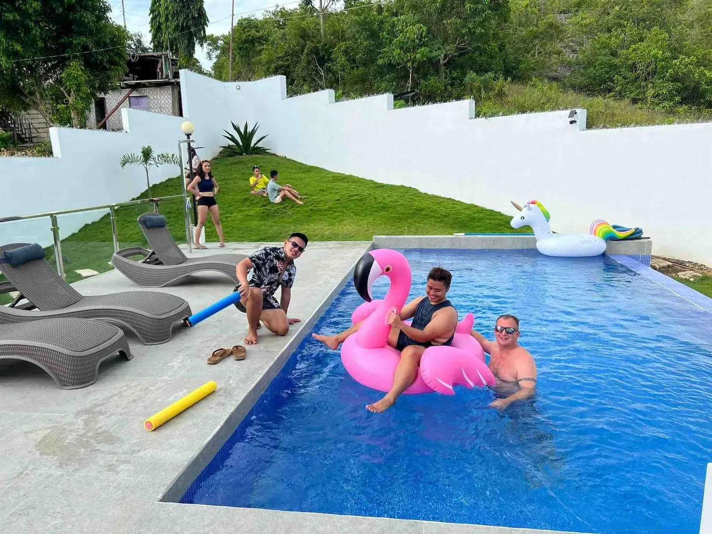 Guests enjoying the private infinity pool