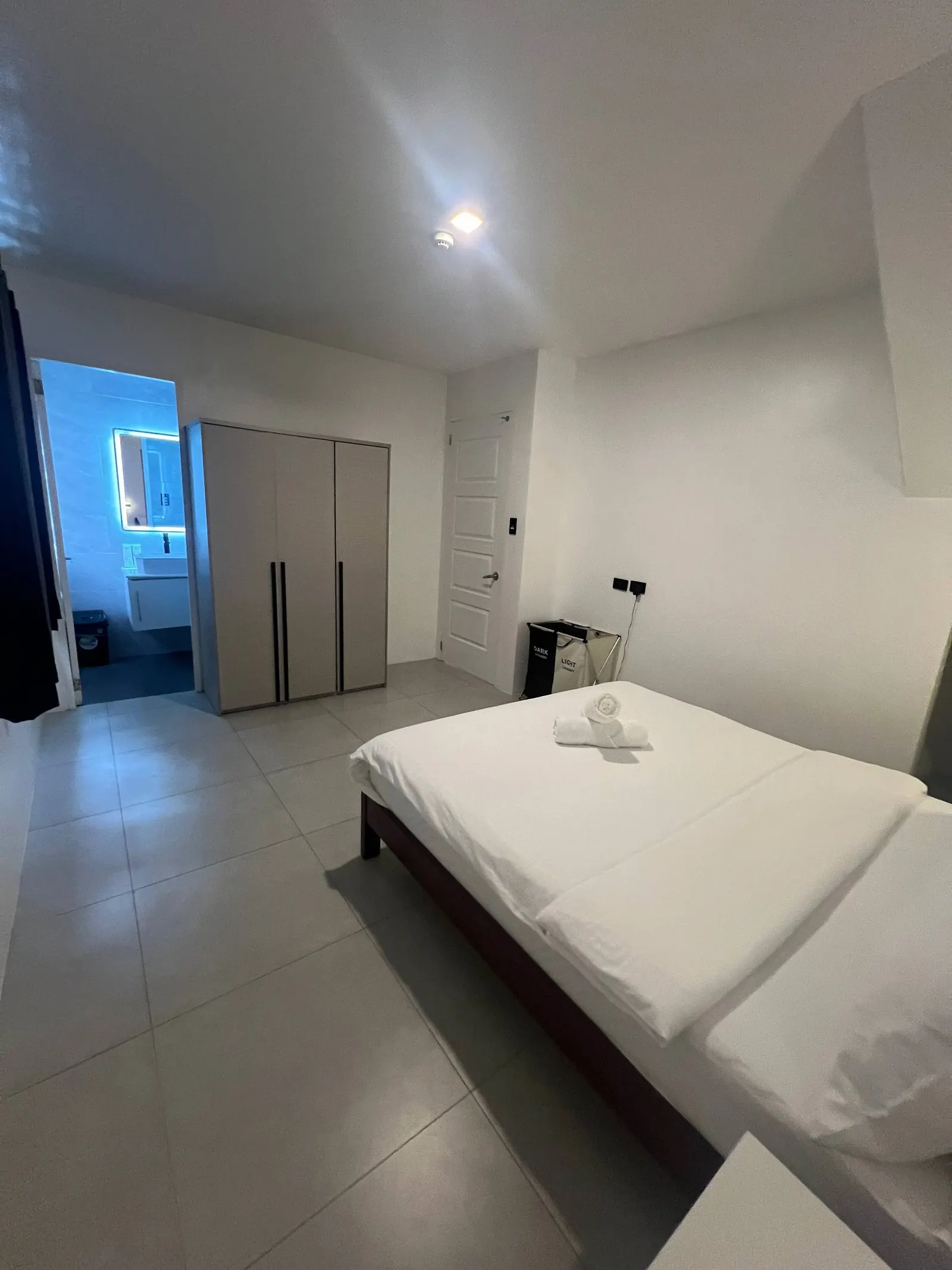 Bedroom 3 with wardrobe, en-suite doorway and blue lighting