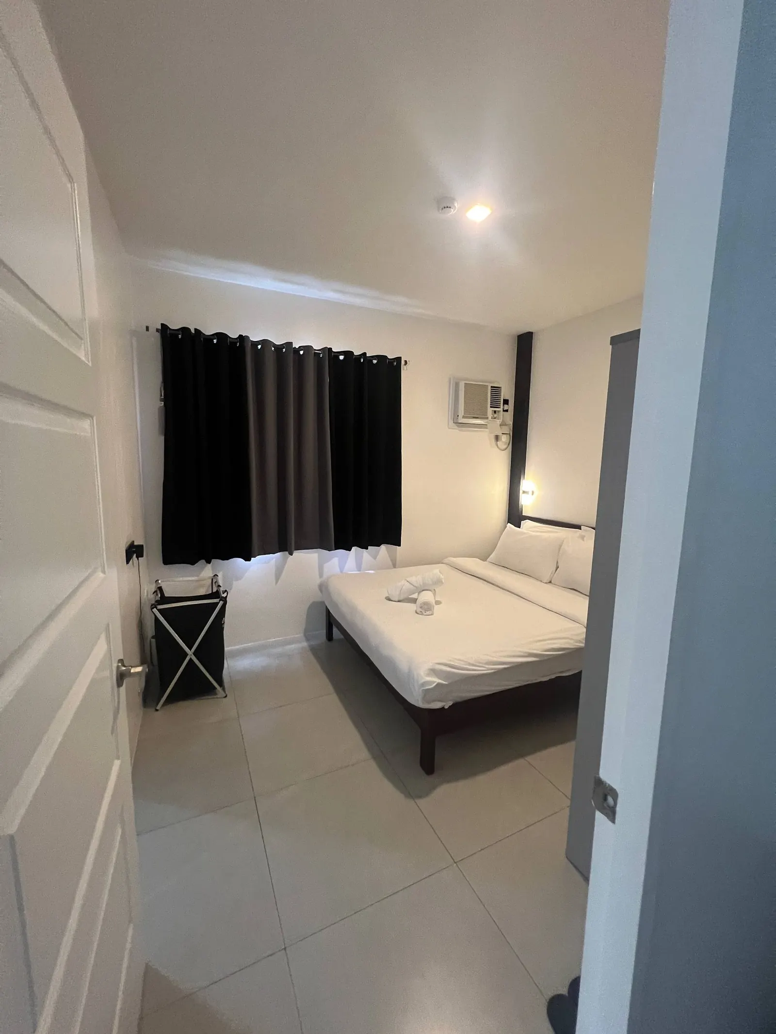 Bedroom 4 from doorway with AC and sconces
