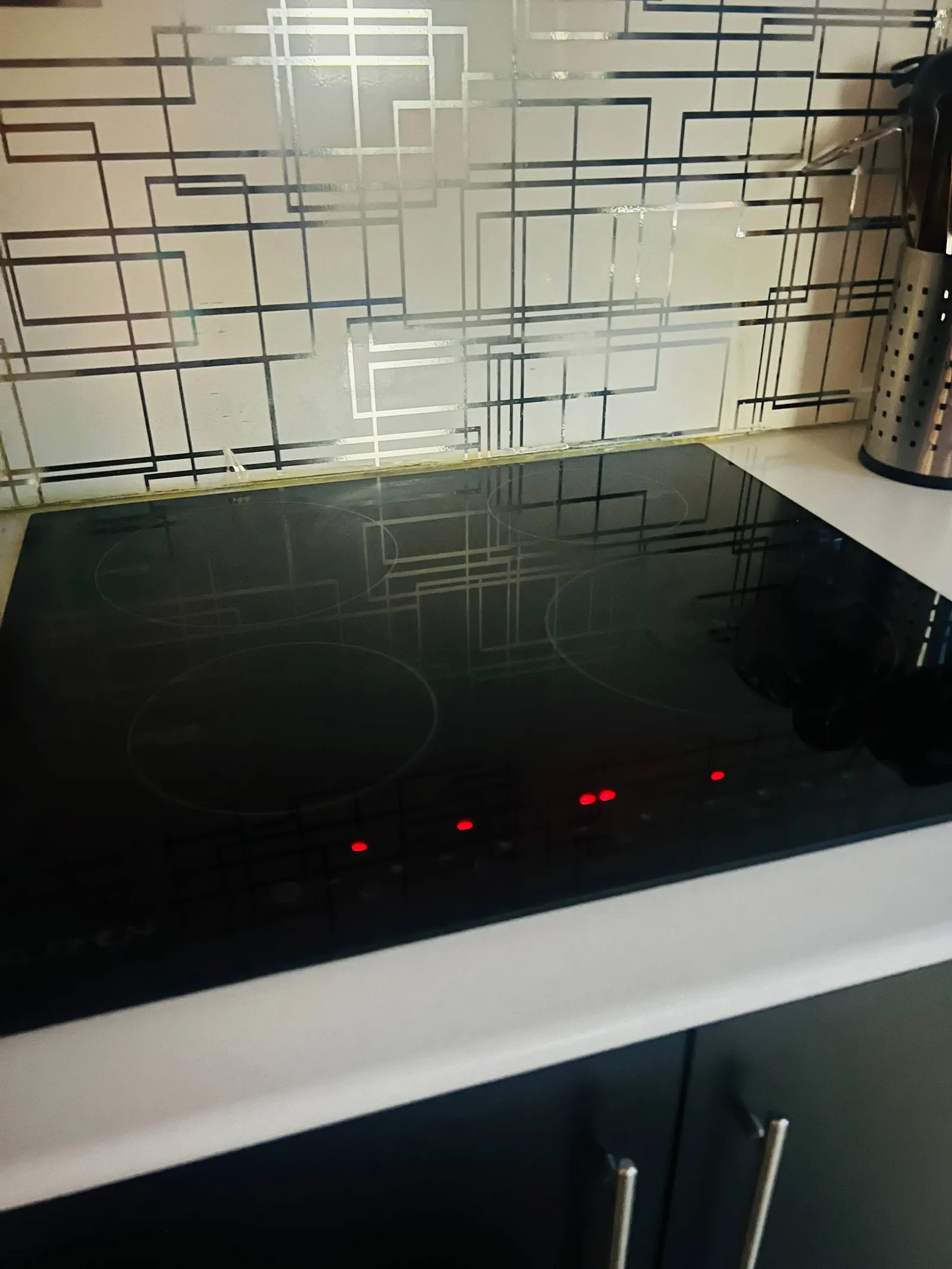 Four-zone induction cooktop close-up
